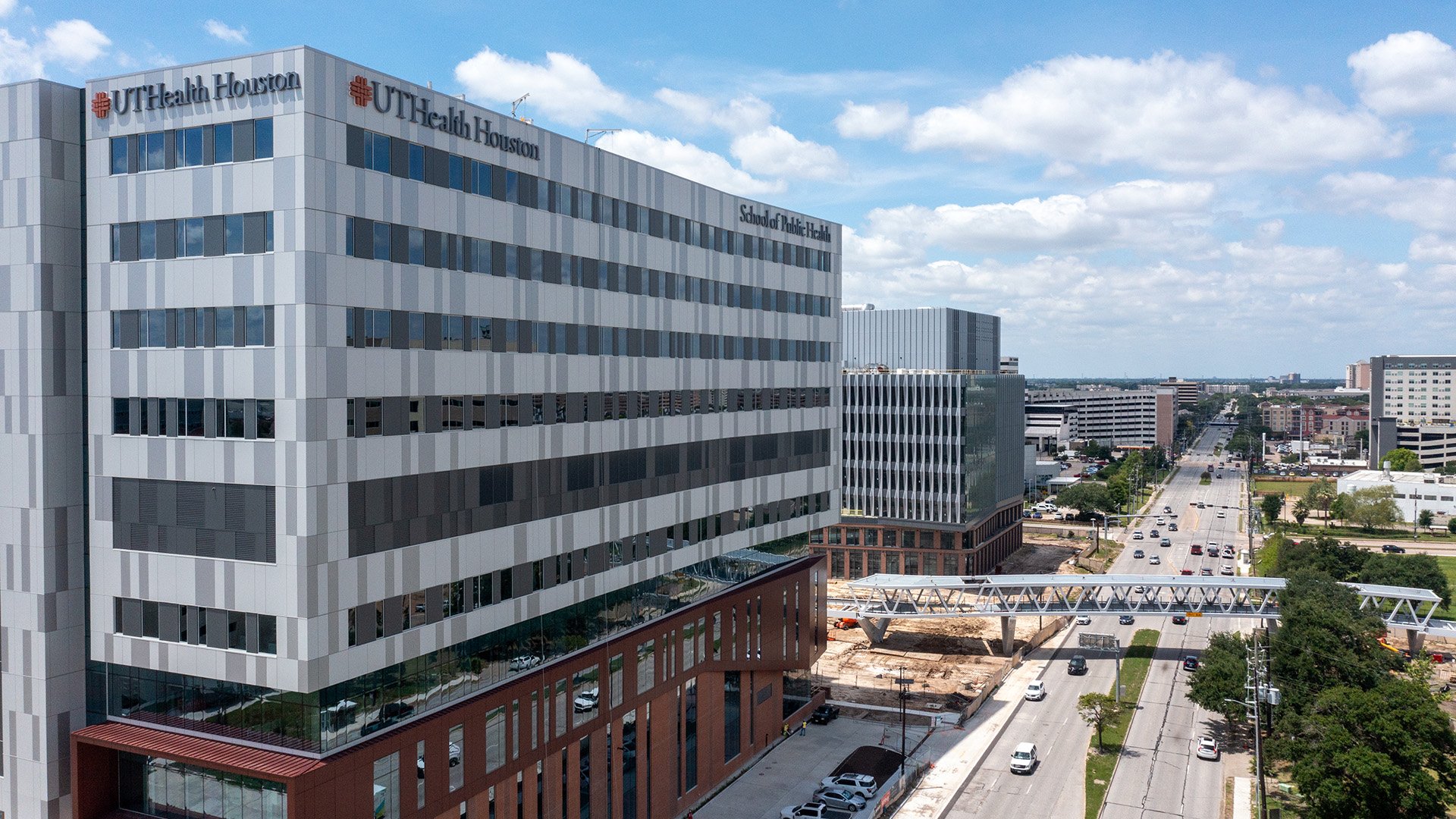 Aerial view of the UTHealth Houston School of Public Health building and surrounding Texas Medical Center area.