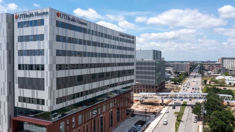 Aerial view of the UTHealth Houston School of Public Health building and surrounding Texas Medical Center area.