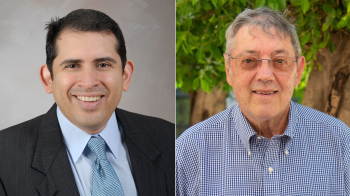 Doctors Absalon Gutierrez and Joseph McCormick posing side by side and smiling.